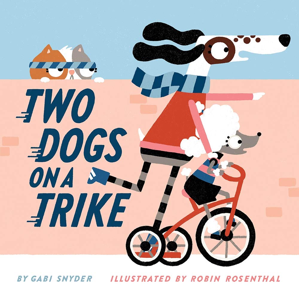 two dogs on a trike